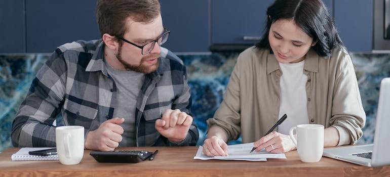 A couple discussing the average rent prices and living costs in Eastchester