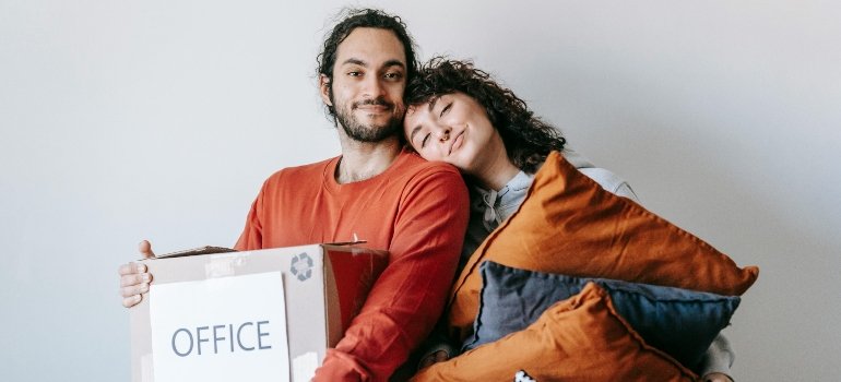 A happy couple that knows how storage units help during big life changes.