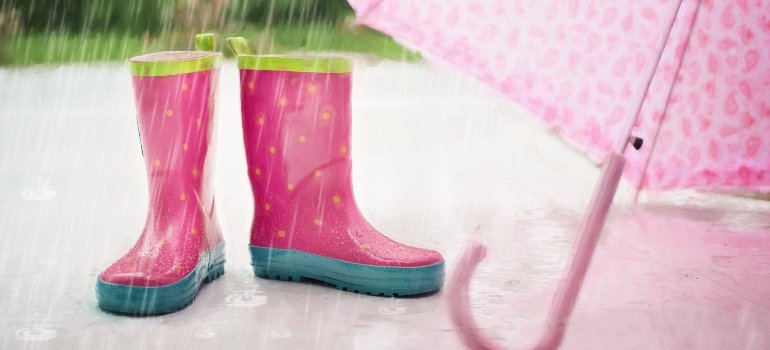 Rain boots and an umbrella.