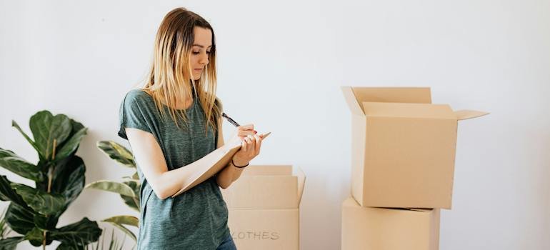 A person taking notes to choose the perfect storage units