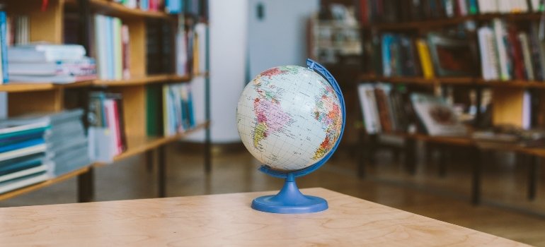 A globe on a desk.