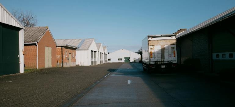 A truck on an empty street on its way to NYC storage units.