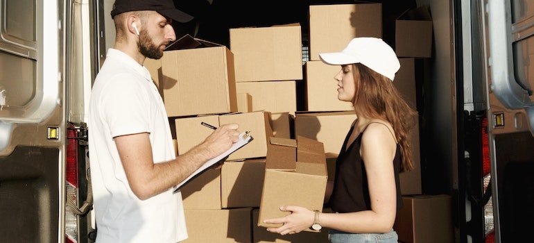 Movers discussing the next client