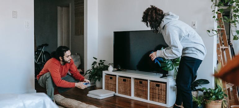 A couple unpacking after a move.