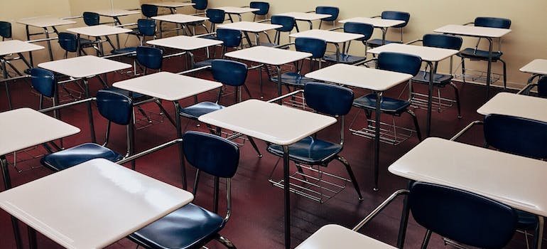 An empty classroom in a school children can attend after moving from Soho to Hell's Kitchen.
