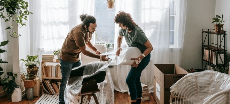 A couple packing items for storage as you should do too if you aim at transforming your home for spring with storage.