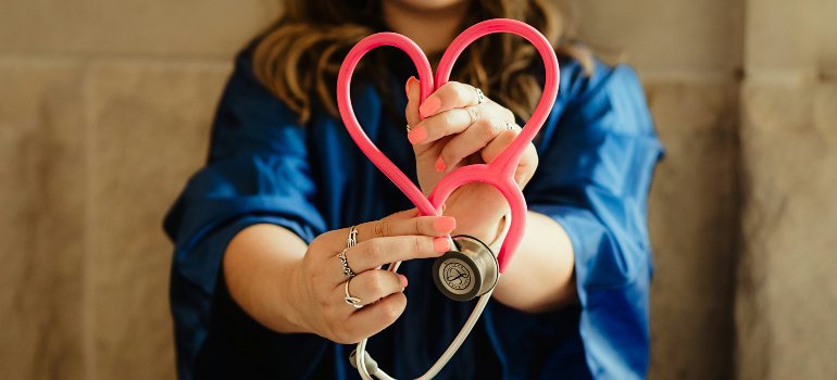 Doctor holding a stethoscope.