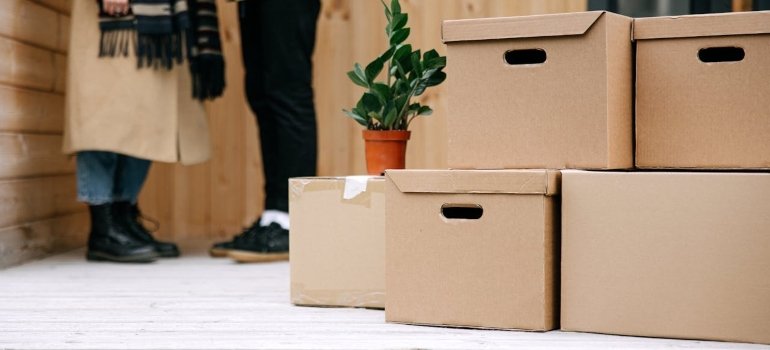 A pile of cardborad moving boxes.