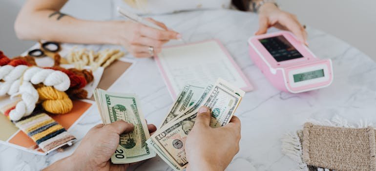 A couple budgeting after moving from Longwood to Parkchester.