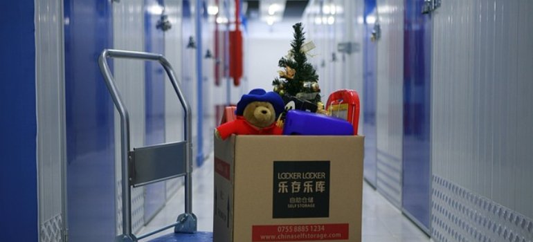 Storage units and some items packed in a box.