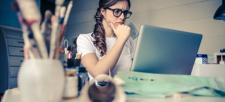 A woman working on a laptop