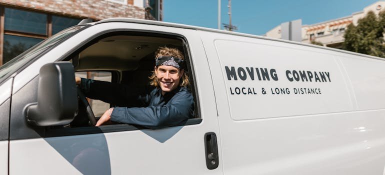 Close up shot of a man in a moving van