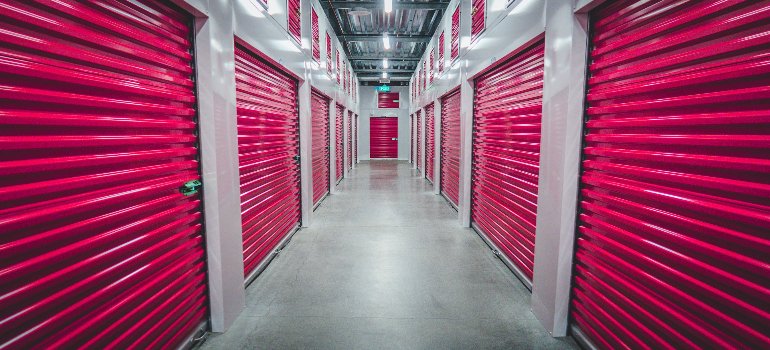 A storage facility with pink doors.