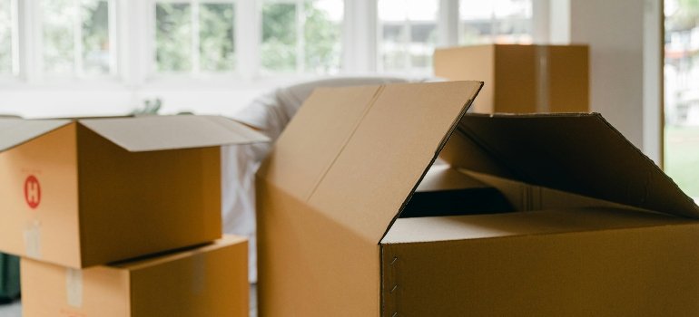 Packed cardboard boxes for keeping a big home clean and organized