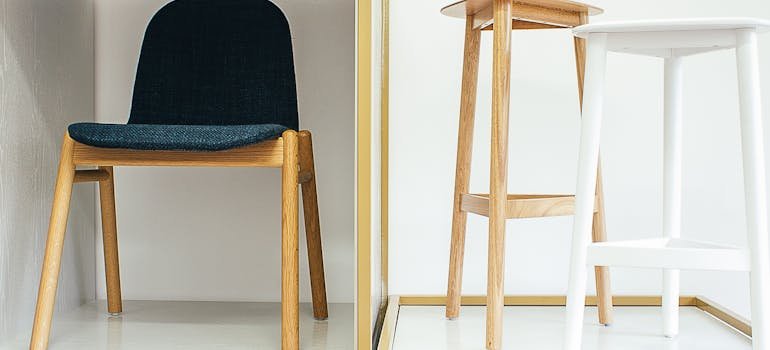 3 wooden chairs in the room