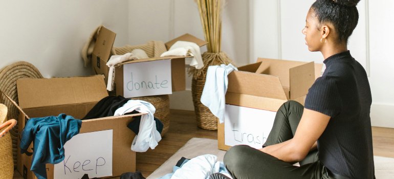 A young woman sorting items