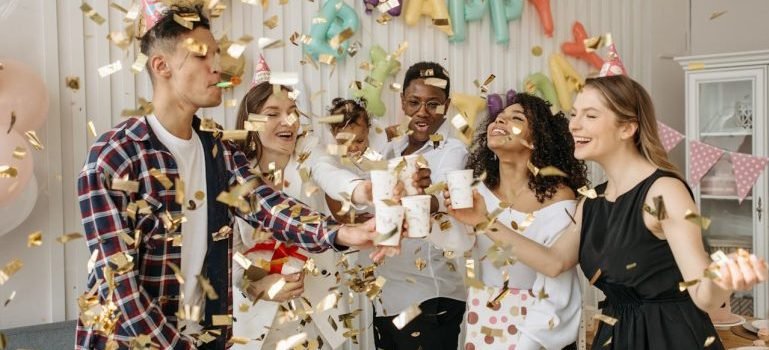 A group of people celebrating a child's birthday