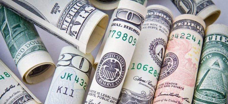 A lot of rolled dollar bills.