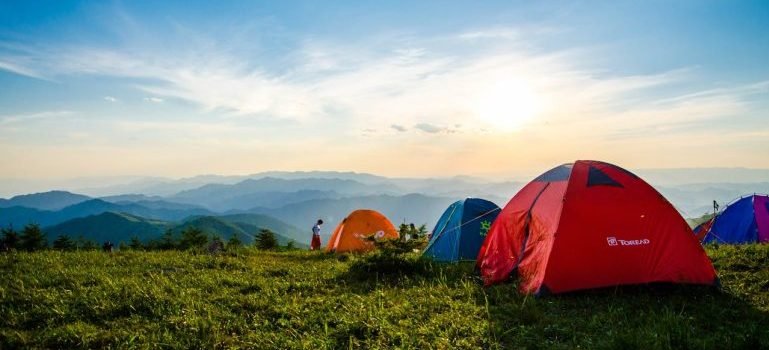 A lot of tents on a mountain.