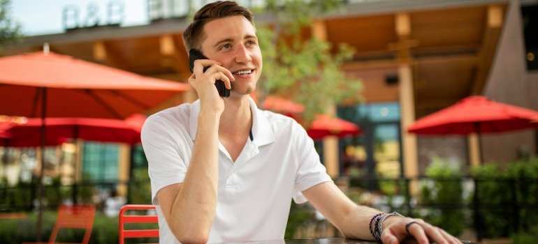 Person talking on the phone about the storage Dumbo professionals offer.