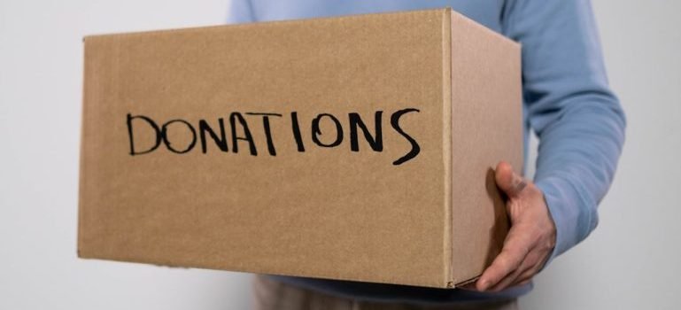 person holding a box