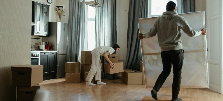 People packing for a move.