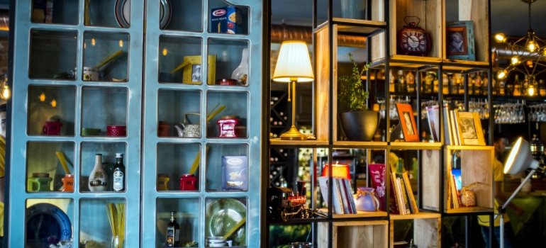 Blue Wooden Display Cabinet, perfect when giving your NYC home a stylish makeover.