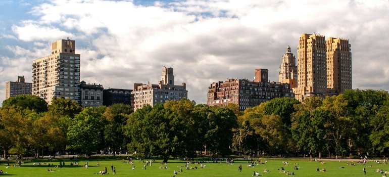 People in Central Park, one of the places for fun activities in Manhattan and Brooklyn.