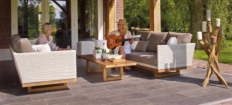 A mom and her daughter after learning how to pack and store outdoor furniture.