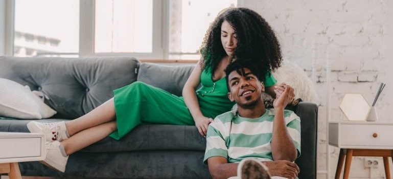 A couple spending time together after transitioning from Manhattan to a larger home in Staten Island