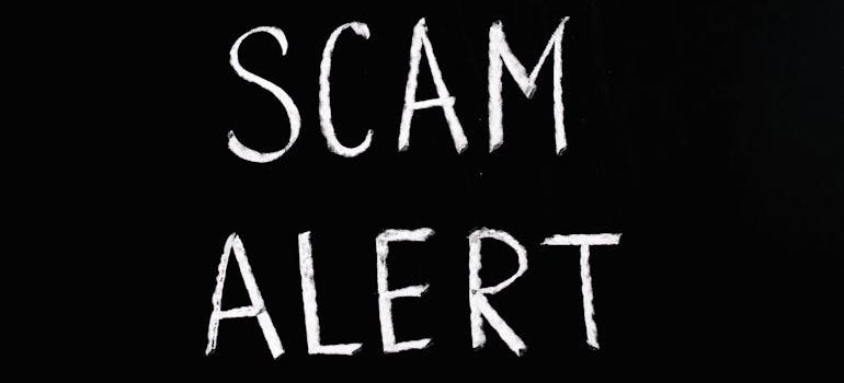 "scam alert" sign as a symbol of why i is necessary to avoid scams when renting storage in NYC.