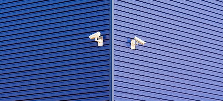 CCTV cameras on the blue walls because every business owner should know before renting storage in NYC that security matters a lot.