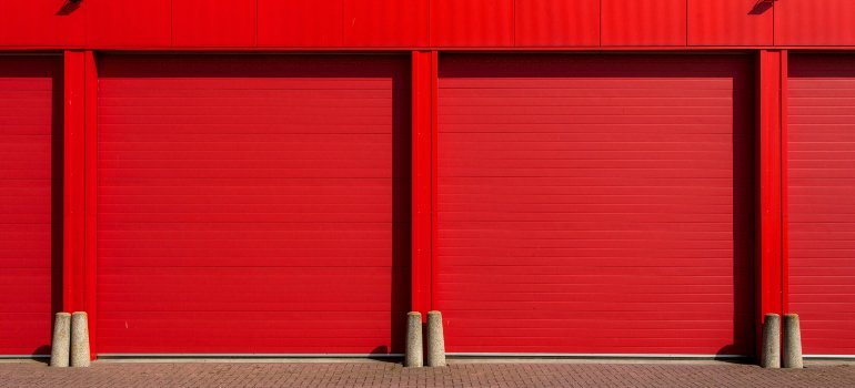 Red ddors to storage units.