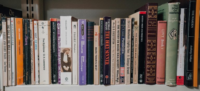 Books stacked on a shelf.