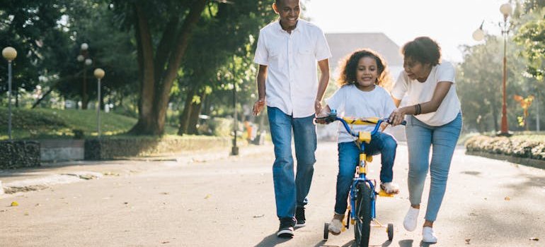 A family spending time outside aftre exploring the storage solutions for growing families in the Bronx.