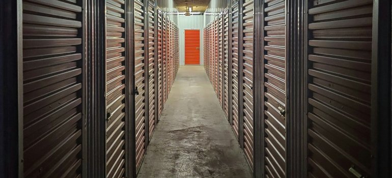 A hallway in the storage facility showcasing the consideration between self-storage vs. full-service storage.