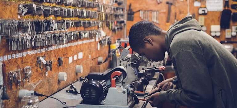 A person doing the work in a workshop.
