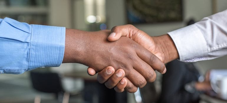 People shaking hands.