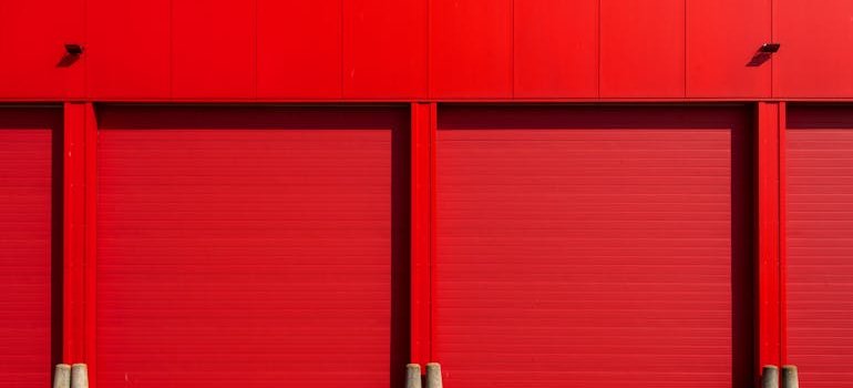 Red doors to storage units.