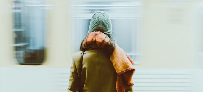 A person standing in a subway