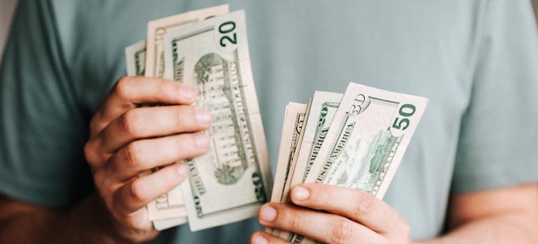 A person counting money.
