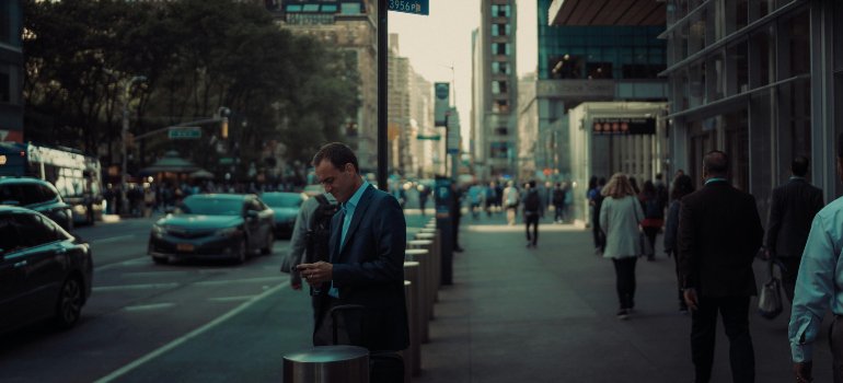 A businessman in a street in NYC.