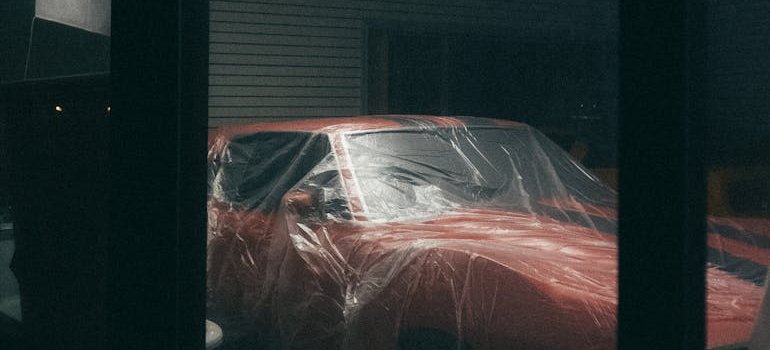 A car protected by a protective cover.