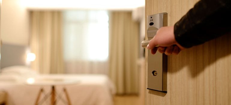 A person opening the door.