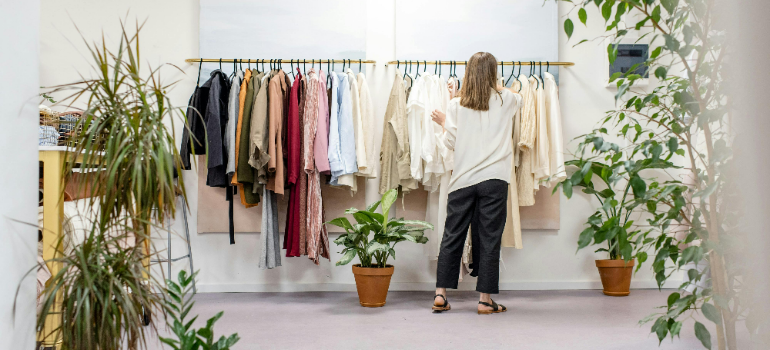 A woman in retail seeing how businesses benefit most from storage rentals in Manhattan.