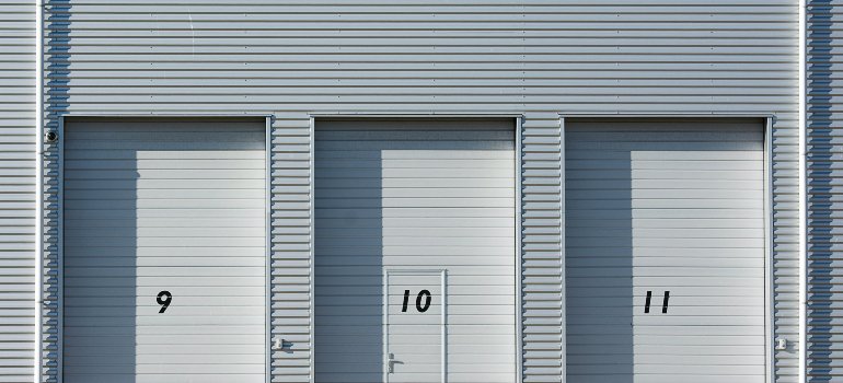 Storage unit doors labeled with numbers.