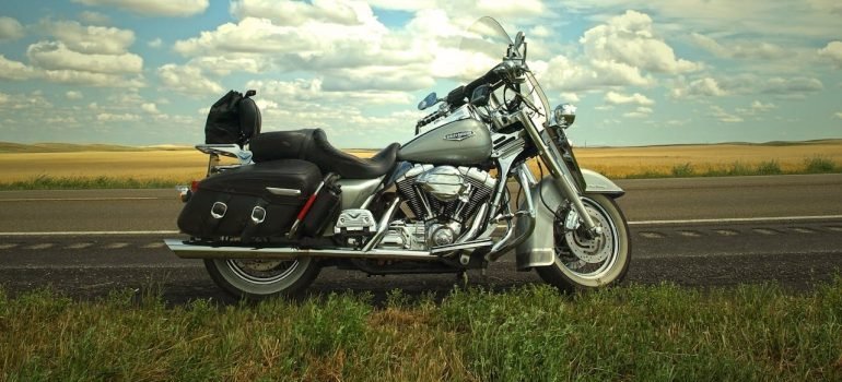 Gray and Silver Cruiser Motorcycle Near Green Grass Lawn