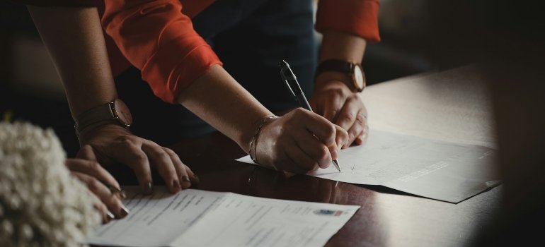 Person signing a document