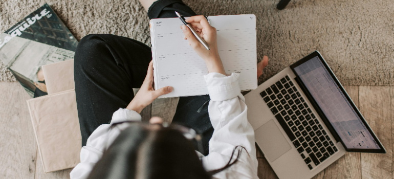 A woman making her storage plan.