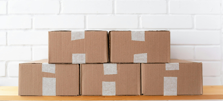 Stacked cardboard moving boxes.